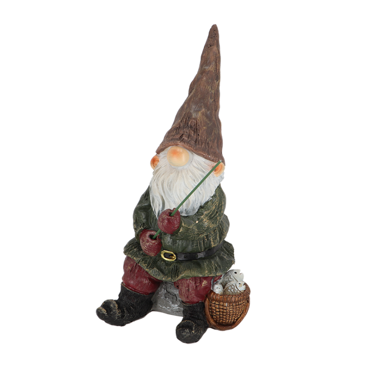 Nain de jardin avec canne à pêche